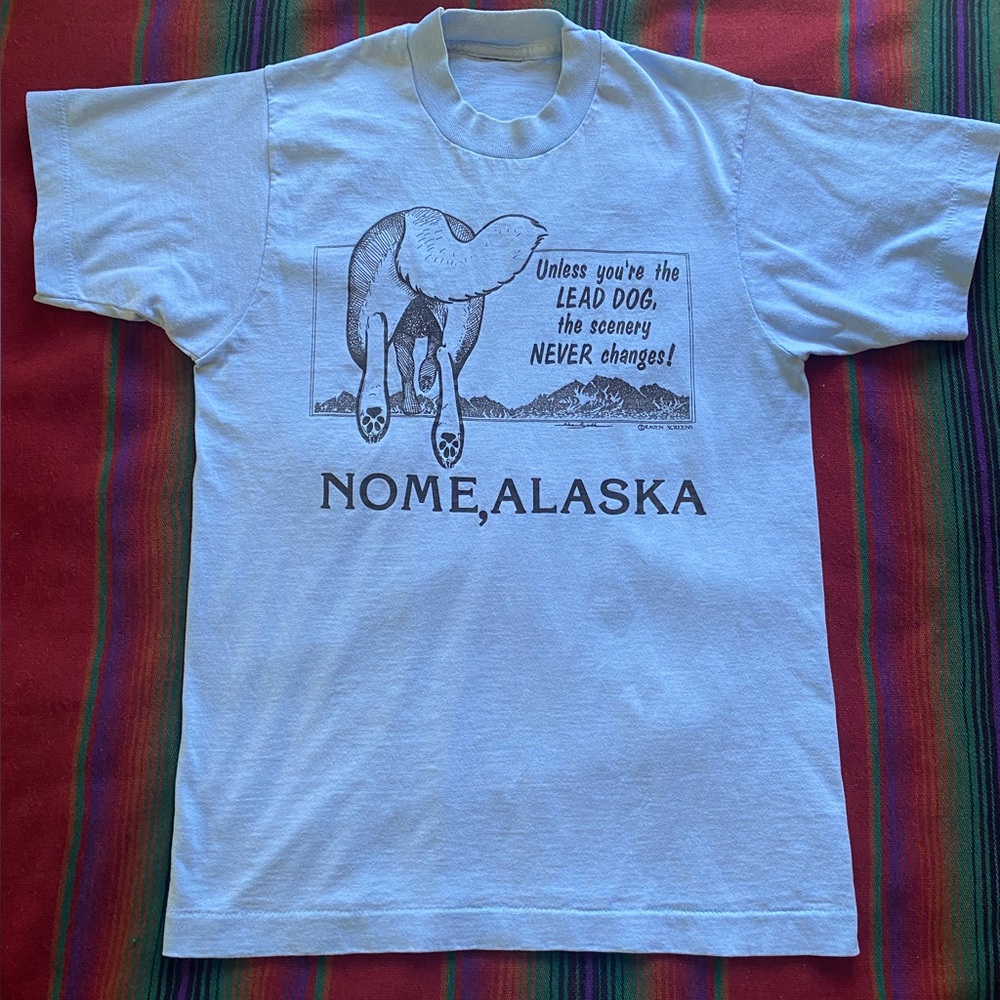 VTG 70’s Nome Alaska graphic Tee. Single Stitch. Like New. Baby Blue/Black. S.